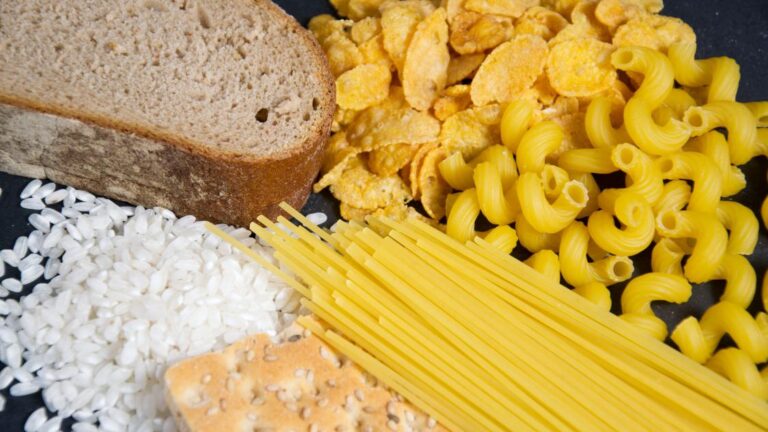 A spread of carbs laid out to showcase what is carb cycling.