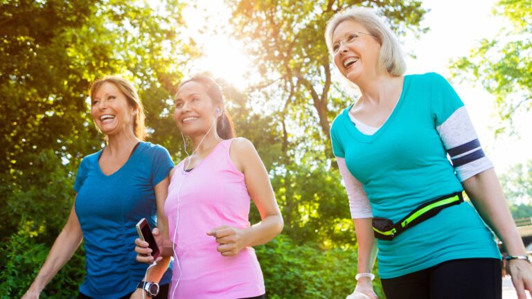 Three women walking and exercising together, demonstrating that it's possible to lose weight and keep it off.